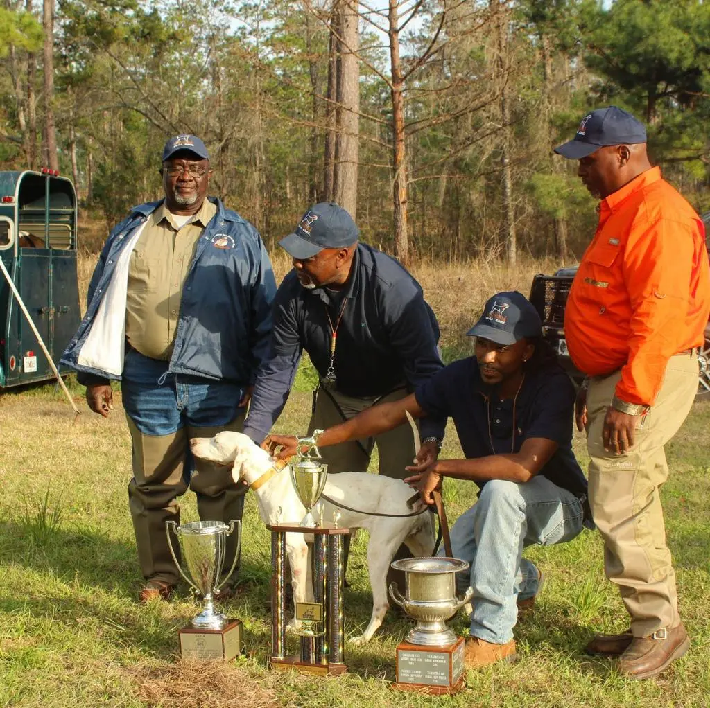Club members with the champion pointer and the silver