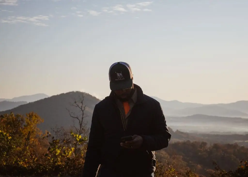 Checking the phone at the Blue Ridge overlook, first light